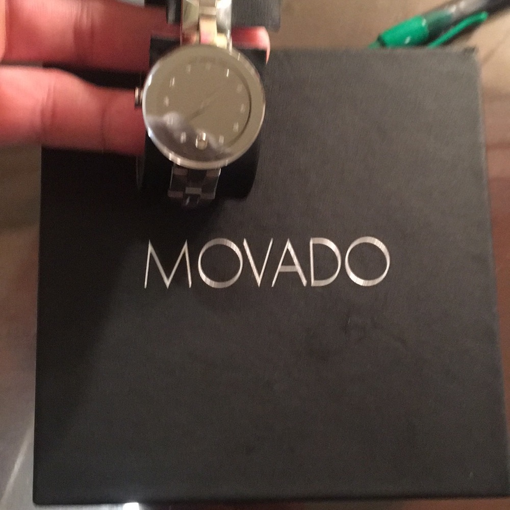 Woman’s movado saphire crystals watch.
